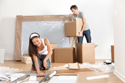 Van loading safety with a worker using protective gear during a move