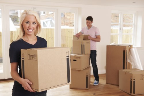 Trained Haroldwood man and van staff handling items carefully during a move