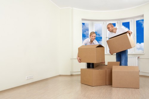 Local moving team handling boxes and furniture for a Harold Wood move
