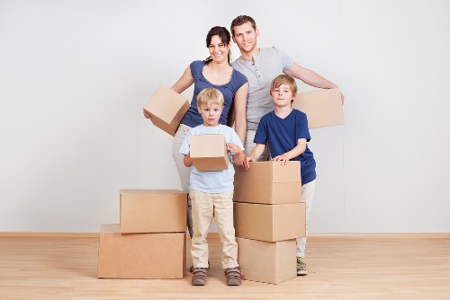 Careful loading of household items into a moving van