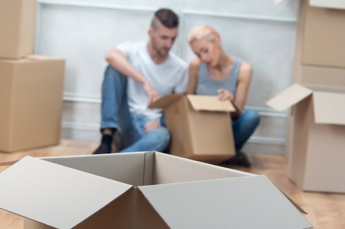 Commercial furniture and boxes being transported by a local mover