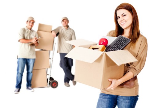 Moving team handling furniture during a removal job