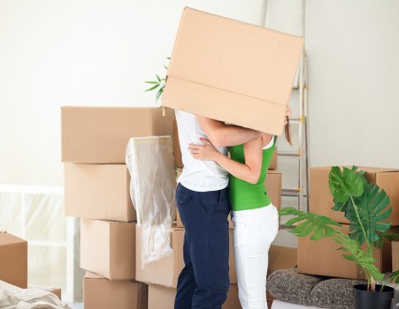 Unloading furniture into a Harold Wood property during moving day