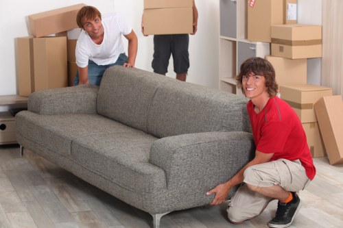 Packing boxes and furniture for transport in Harold Wood