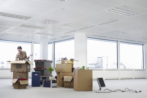 Professional movers loading items for a house or office relocation in Harold Wood