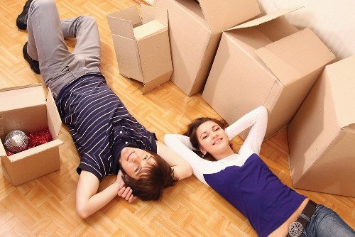 Movers handling furniture and household items for a local relocation